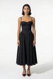 Black sleeveless backless midi dress for women by FJØRNA, featuring pleated design and halter neckline.
