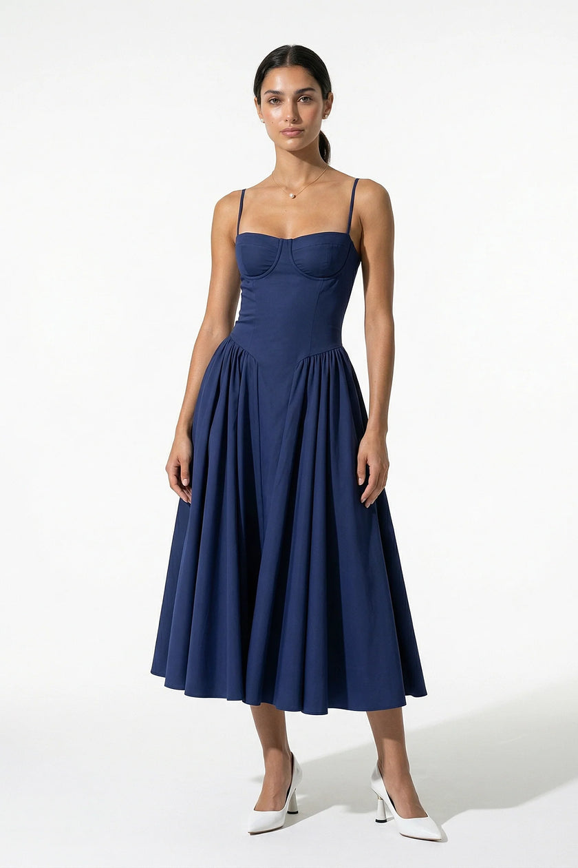 Deep blue FJØRNA sleeveless backless midi dress with pleats and halter neckline, perfect for elegant occasions.