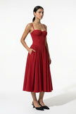 Red FJØRNA backless sleeveless midi dress with pleated design, halter neckline, and full-body view for women.