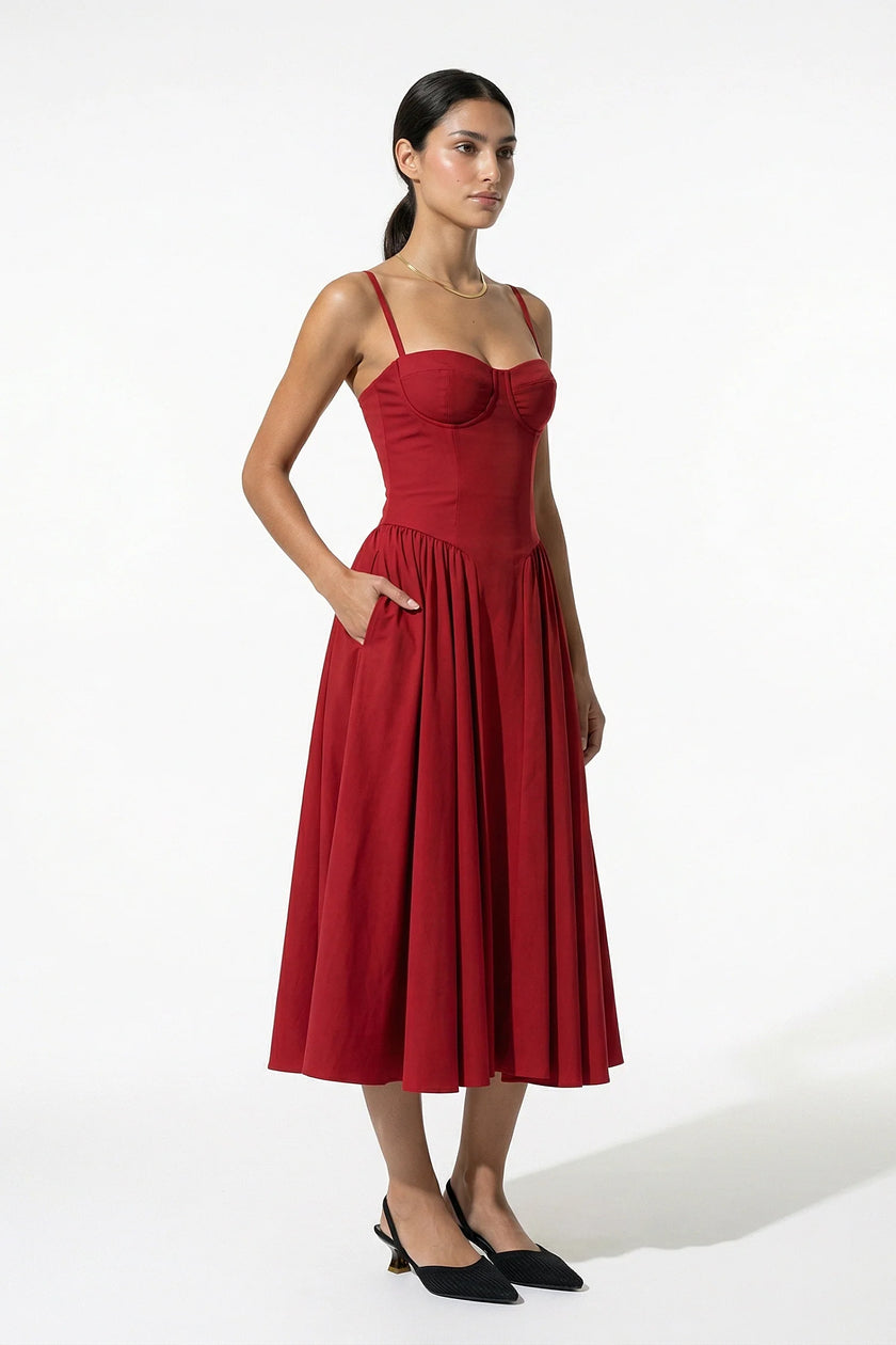 Red FJØRNA backless sleeveless midi dress with pleated design, halter neckline, and full-body view for women.