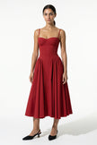 Red FJØRNA backless midi dress for women featuring a sleeveless, pleated design with a halter neckline.