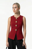 Women's sleeveless waistcoat by FJØRNA with tailored fit and metal button details in deep red.