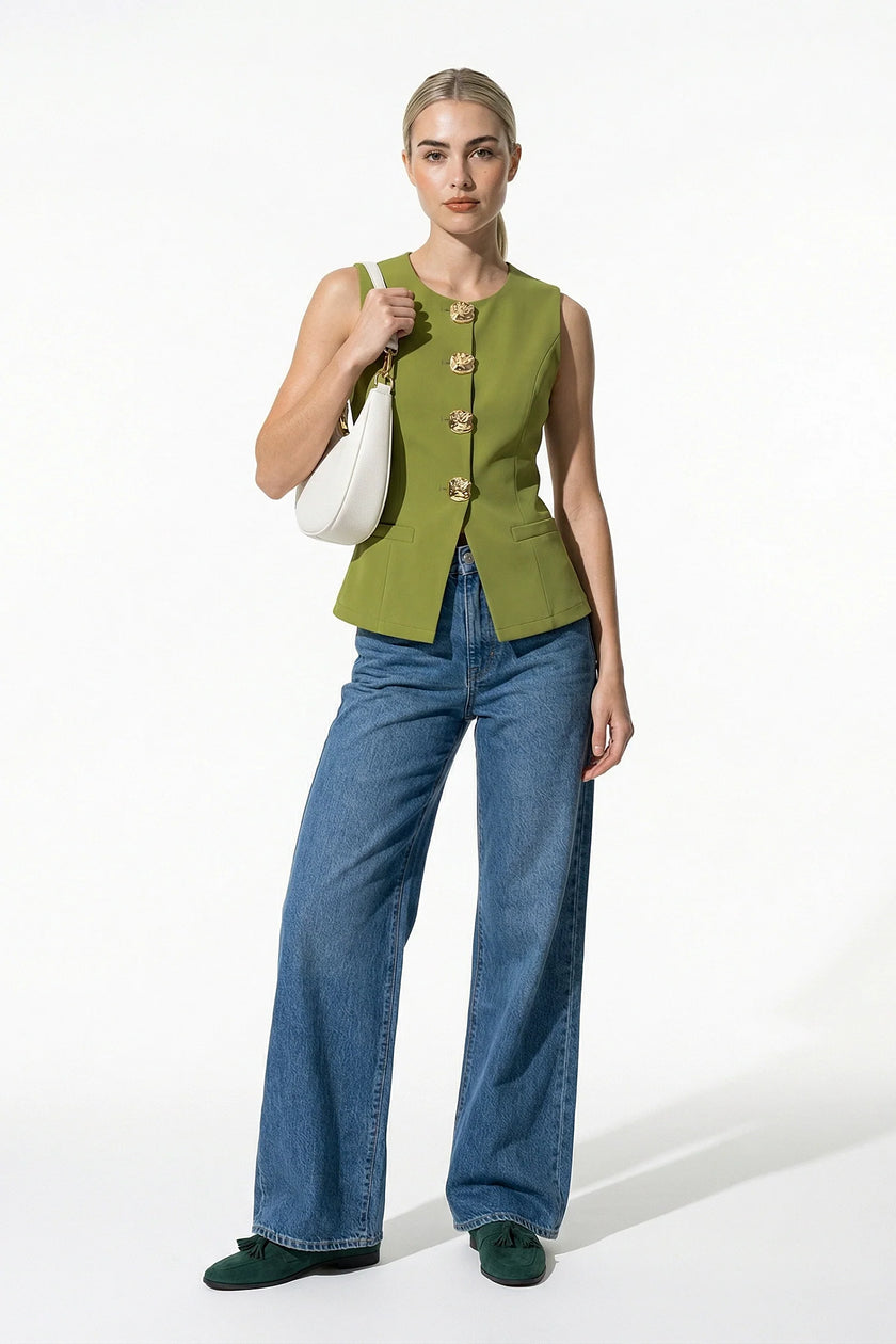 Women’s sleeveless olive waistcoat with tailored fit and metal button details by FJØRNA, shown full body.