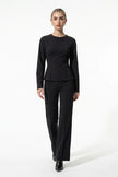 FJØRNA women's slim fit co-ord set with long sleeve top and wide-leg trousers in black, full-body view.