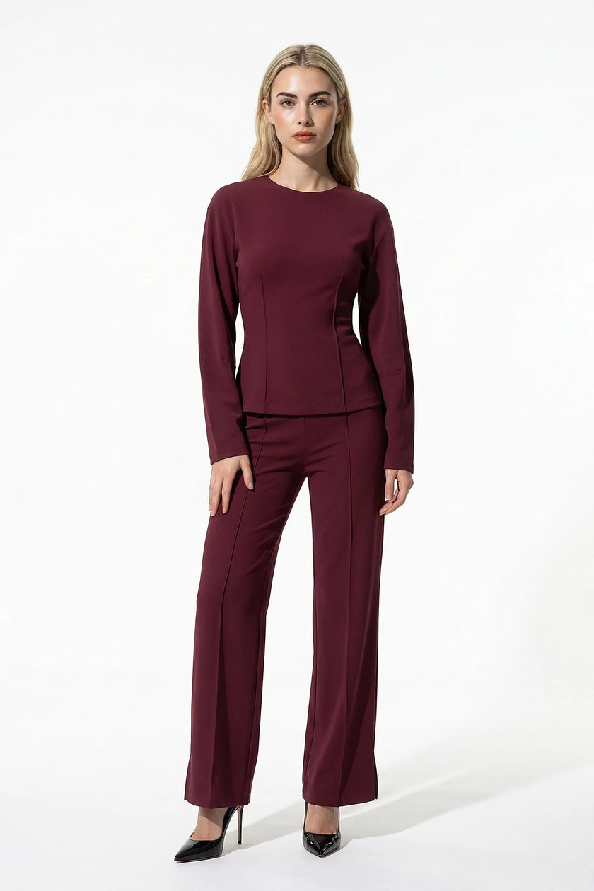 FJØRNA women's slim fit co-ord set with long sleeve top and wide leg trousers in wine red, full-body view.