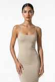 FJØRNA beige sleeveless bodycon maxi dress for women, breathable summer dress shown in medium shot.