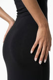 Close-up of FJØRNA black sleeveless bodycon maxi dress for women, highlighting breathable fabric and sleek summer style.