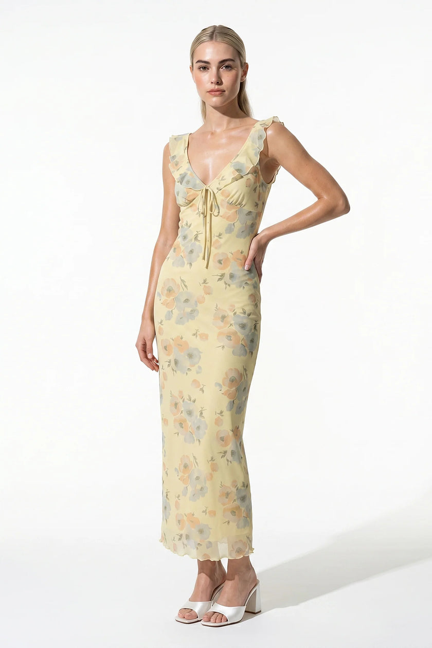 Yellow sleeveless maxi dress for women by FJØRNA, flowing summer casual dress shown in full body view.