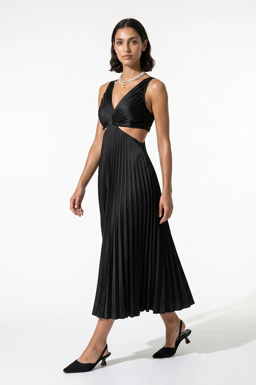 Black FJØRNA women's pleated maxi dress with V-neck, suspender straps, and hollow waist detail, full-body view.