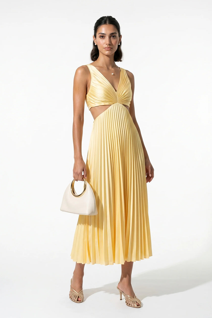 Yellow FJØRNA women's pleated maxi dress with V-neck, suspender straps, and hollow waist, full-body view.