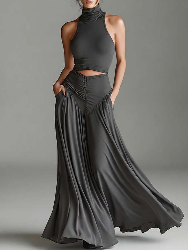 FJØRNA charcoal knit turtleneck mini dress, evening dress style with long sleeves and fitted silhouette, shown on a model.