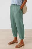 FJØRNA lightweight summer trousers for women with straight legs, breathable fabric and functional pockets, ideal for warm weather.