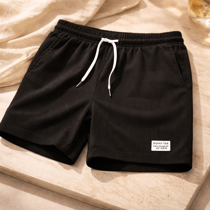 FJØRNA men's corduroy shorts with drawstring waist, casual pants featuring textured fabric and comfortable fit.