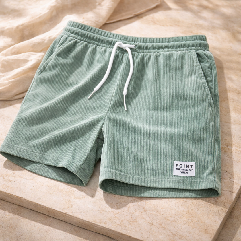 Men's corduroy shorts with drawstring waist from FJØRNA, featuring a casual fit and textured fabric.