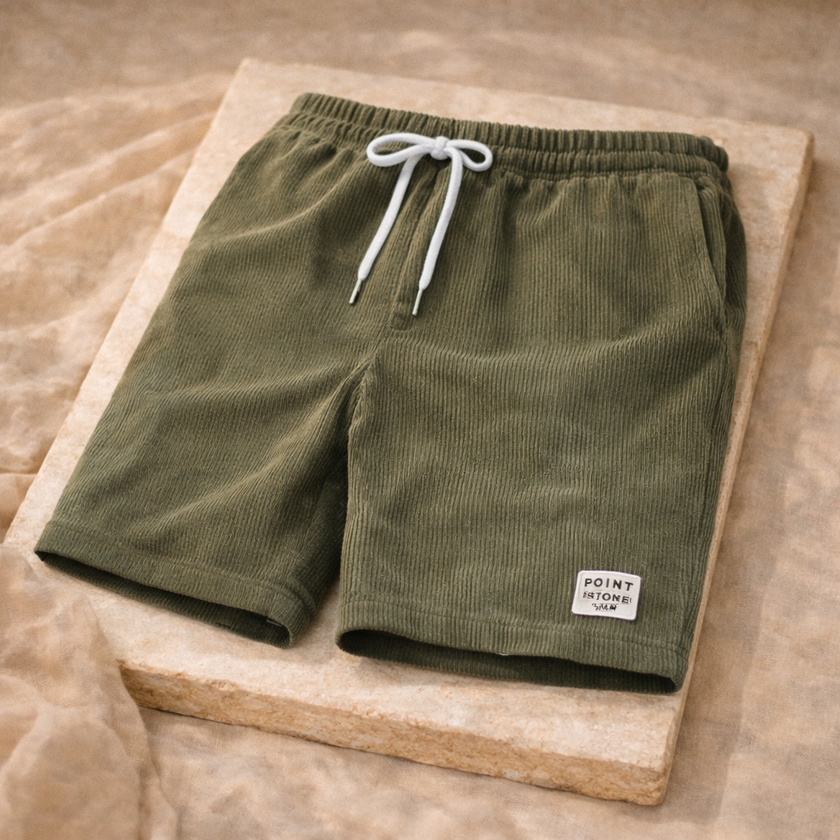 Men's FJØRNA corduroy shorts with drawstring waist, casual style, shown in a relaxed fit with front pockets.