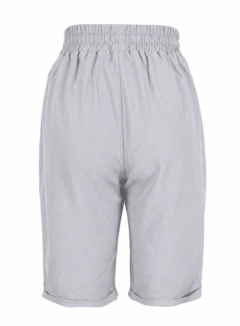 FJØRNA women's lightweight summer capri pants with relaxed fit, drawstring waist, and breathable fabric for comfortable wear.