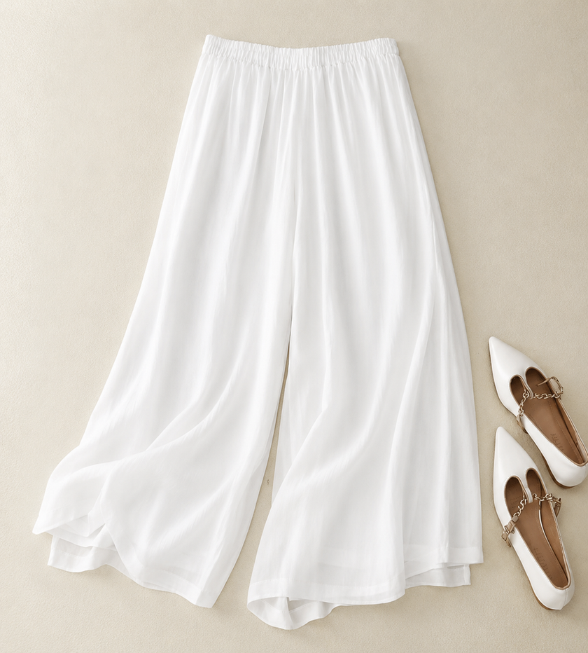 FJØRNA lightweight summer women's trousers with straight leg, breathable flowy fabric, ideal for warm weather and casual wear.
