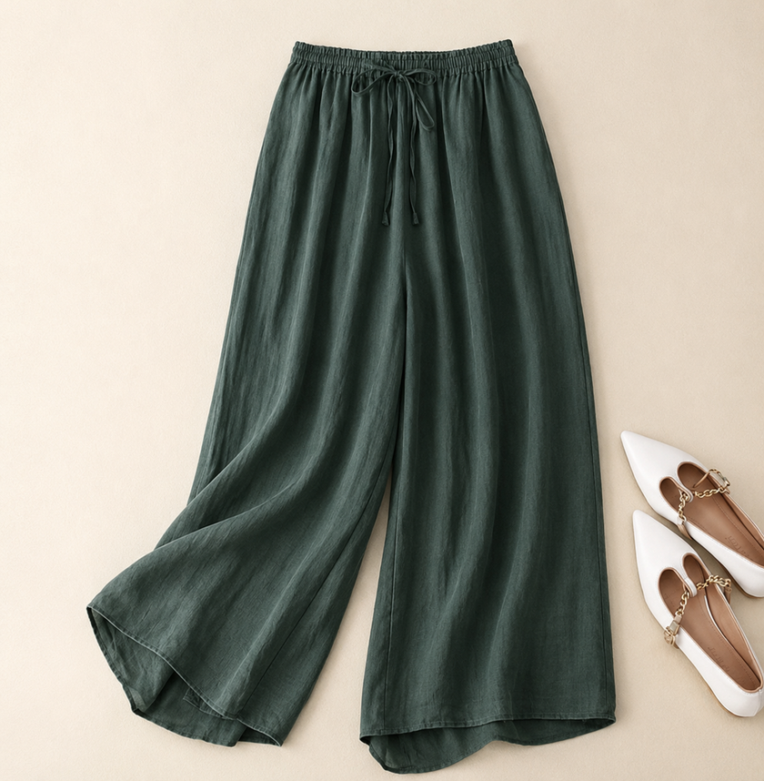 FJØRNA lightweight summer trousers for women, straight leg, breathable, flowy fabric, ideal for warm weather.