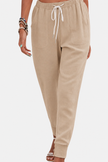 FJØRNA Tara women's jogger pants with drawstring waist and elastic ankle cuffs, comfortable casual activewear in a relaxed fit.