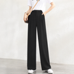 FJØRNA women's lightweight summer trousers with high waist and wide-leg design, made from breathable fabric for comfort.