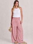 FJØRNA linen summer trousers for women, high waist wide-leg design with drawstring, lightweight and breathable for warm weather.