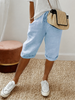 FJØRNA women's lightweight summer capri pants with relaxed fit, drawstring waist, and breathable fabric, suitable for warm weather.