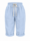 Lightweight women’s summer Capri pants by FJØRNA with relaxed fit, drawstring waist, and breathable fabric for comfort.