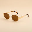 FJØRNA Retro Studio sunglasses with oversized round frames, stylish and trendy eyewear for a vintage-inspired look.