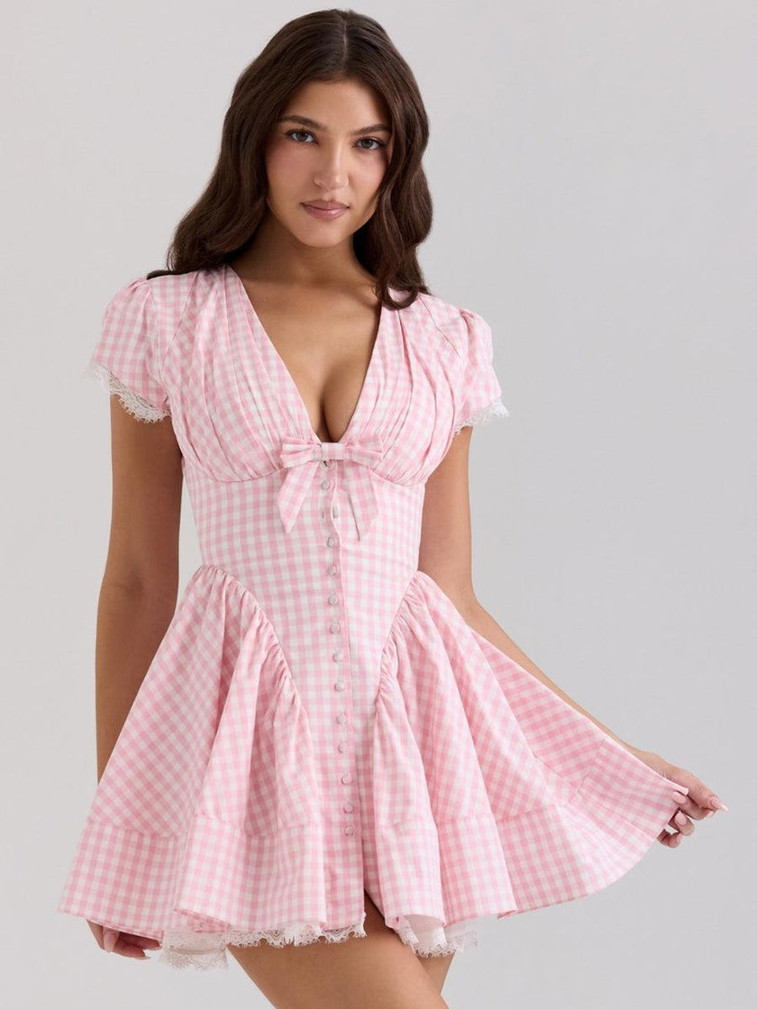 FJØRNA Coquette Gingham women's mini dress with sleeveless design and fitted waist, perfect for party and daytime wear.