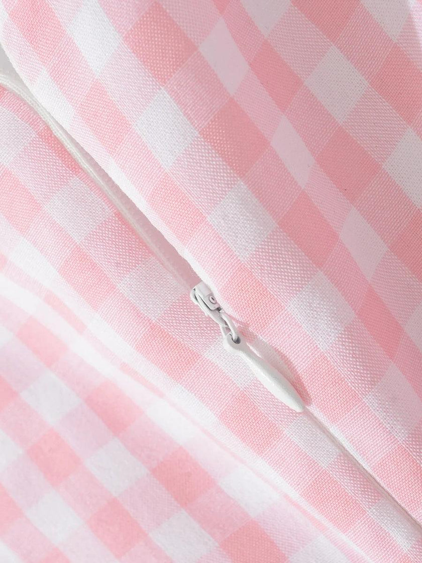 FJØRNA Coquette Gingham Women's Mini Dress showcasing a stylish gingham pattern and sleeveless design for party or day wear.