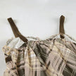 FJØRNA Coquette plaid mini dress featuring a fitted silhouette and stylish pattern, perfect for casual or semi-formal wear.