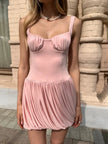 FJØRNA Coquette pleated mini dress featuring a stylish design with pleats and a fitted silhouette, perfect for casual or dressy occasions.