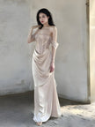FJØRNA satin corset maxi dress for women, elegant evening and formal wear with a fitted bodice and flowing skirt.