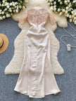 Elegant satin corset maxi dress for women by FJØRNA, perfect for evening and formal occasions, featuring a fitted bodice and flowing skirt.