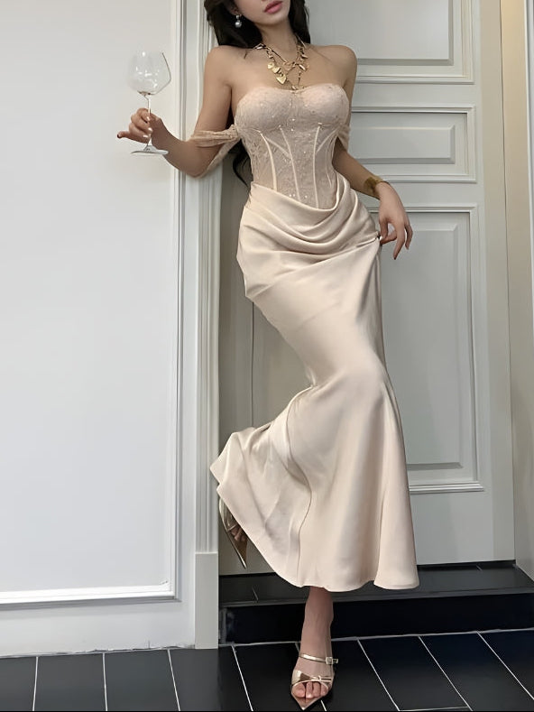 FJØRNA satin corset maxi dress for women, elegant evening and formal wear, featuring a fitted bodice and flowing skirt.