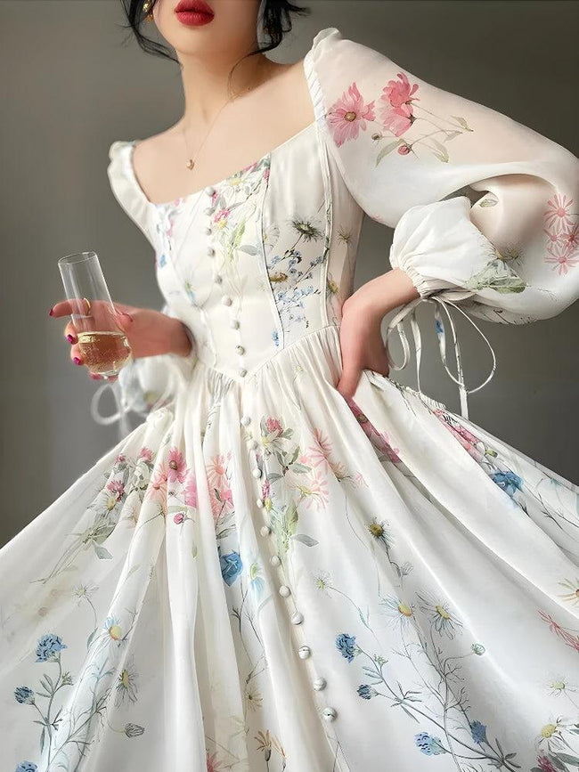 FJØRNA cottagecore women's maxi dress with floral pattern, flowing fabric, perfect for summer and special occasions.