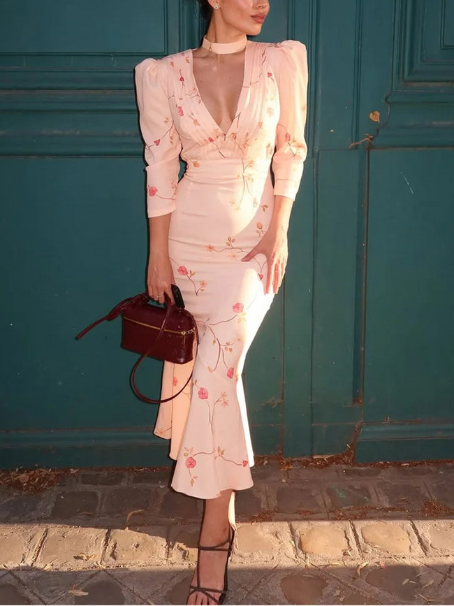 FJØRNA cottagecore V-neck women's midi dress with floral pattern, perfect for day to night wear, featuring a soft, flowing fabric.