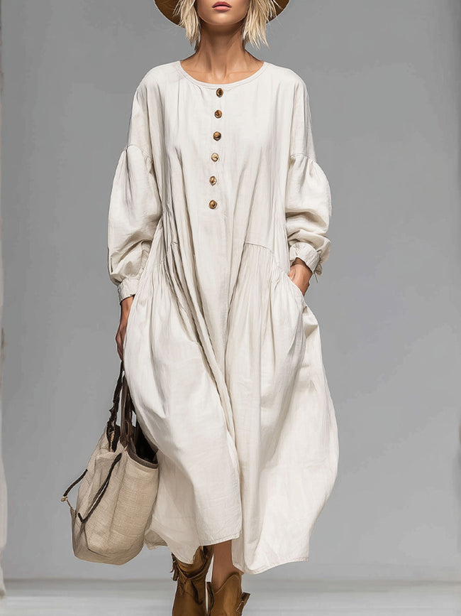 Cotton button-front midi dress for women by FJØRNA, featuring a relaxed fit and classic collar in soft cotton fabric.