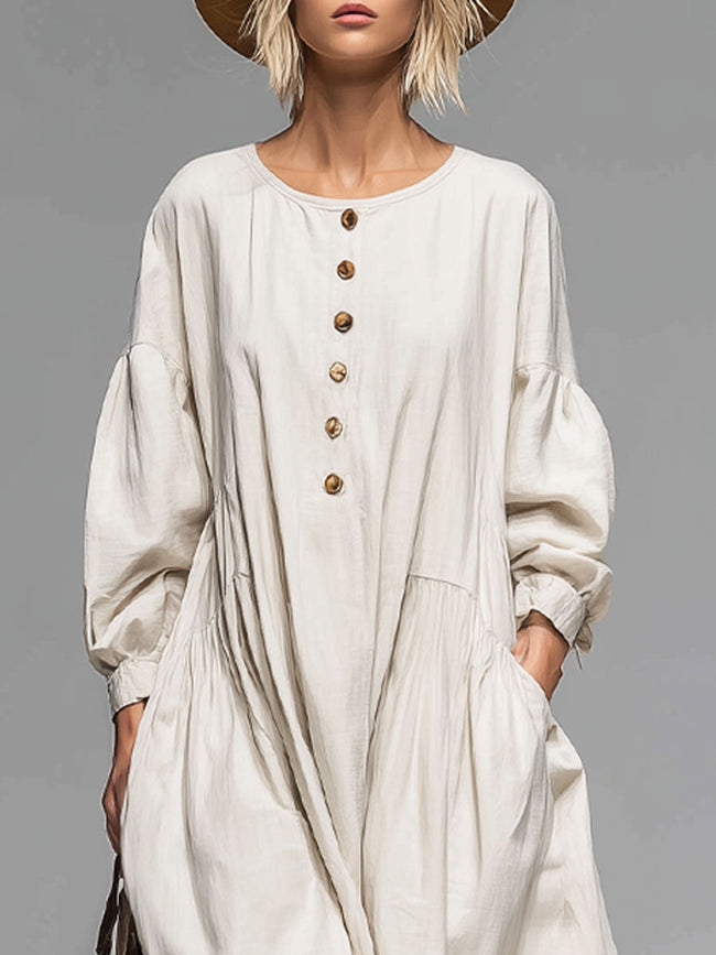 FJØRNA cotton button-front midi dress for women, featuring a relaxed fit with a classic collar and front button closure.