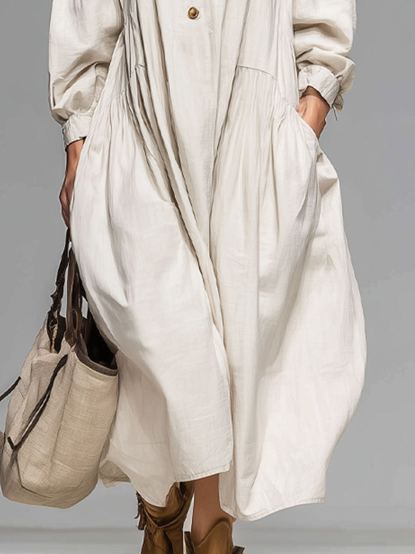 FJØRNA cotton button-front midi dress for women, showcasing the stylish dress with front buttons and a relaxed fit.