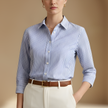 Cotton striped button-down shirt for women, relaxed fit, stylish tops by FJØRNA with classic vertical stripes.