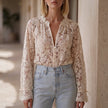 Cream white floral V-neck lace summer blouse for women by FJØRNA, featuring delicate lace details and a flattering fit.