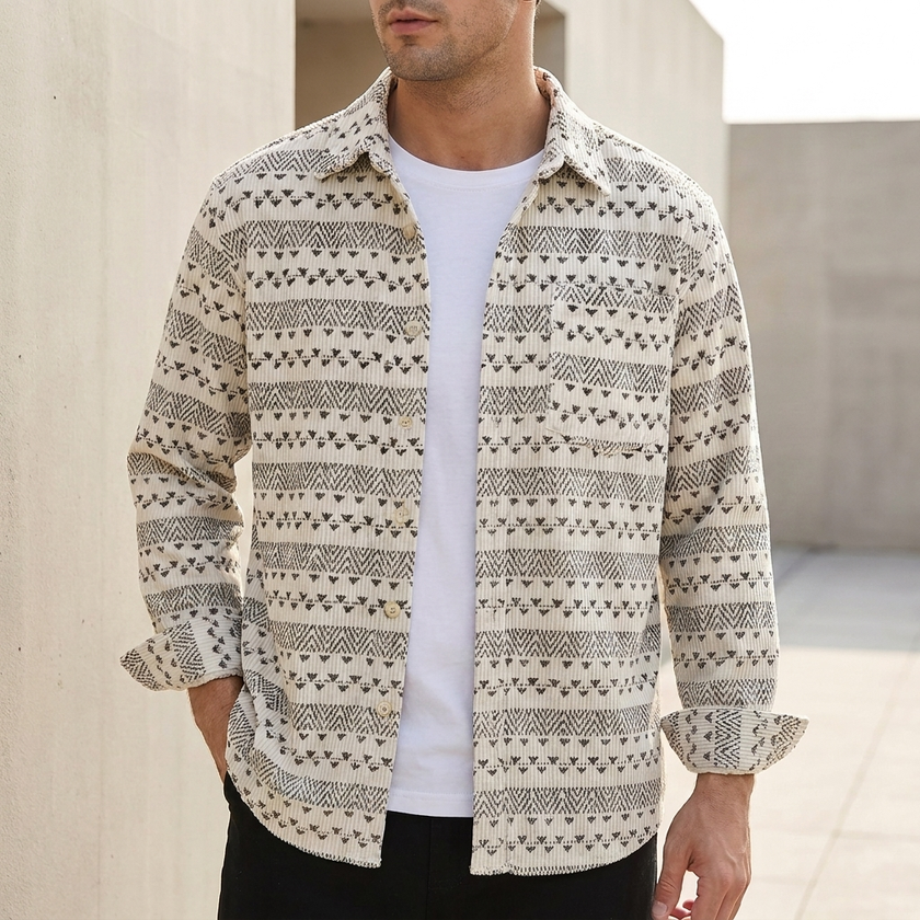 Men's relaxed FJØRNA button-front shirt with geometric pattern in cream, featuring a casual fit and stylish design.