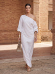 FJØRNA women's summer maxi dress in asymmetric linen with flowing design, perfect for warm weather and casual occasions.