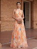 Elegant FJØRNA women's maxi dress with a printed halter neck design, flowing fabric, and stylish silhouette.