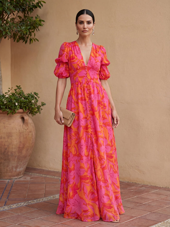 Elegant FJØRNA women's maxi dress with V-neck, flowing fabric, perfect for evening wear and special occasions.