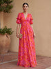 Elegant FJØRNA women's maxi dress with V-neck, flowing fabric, perfect for evening wear and special occasions.