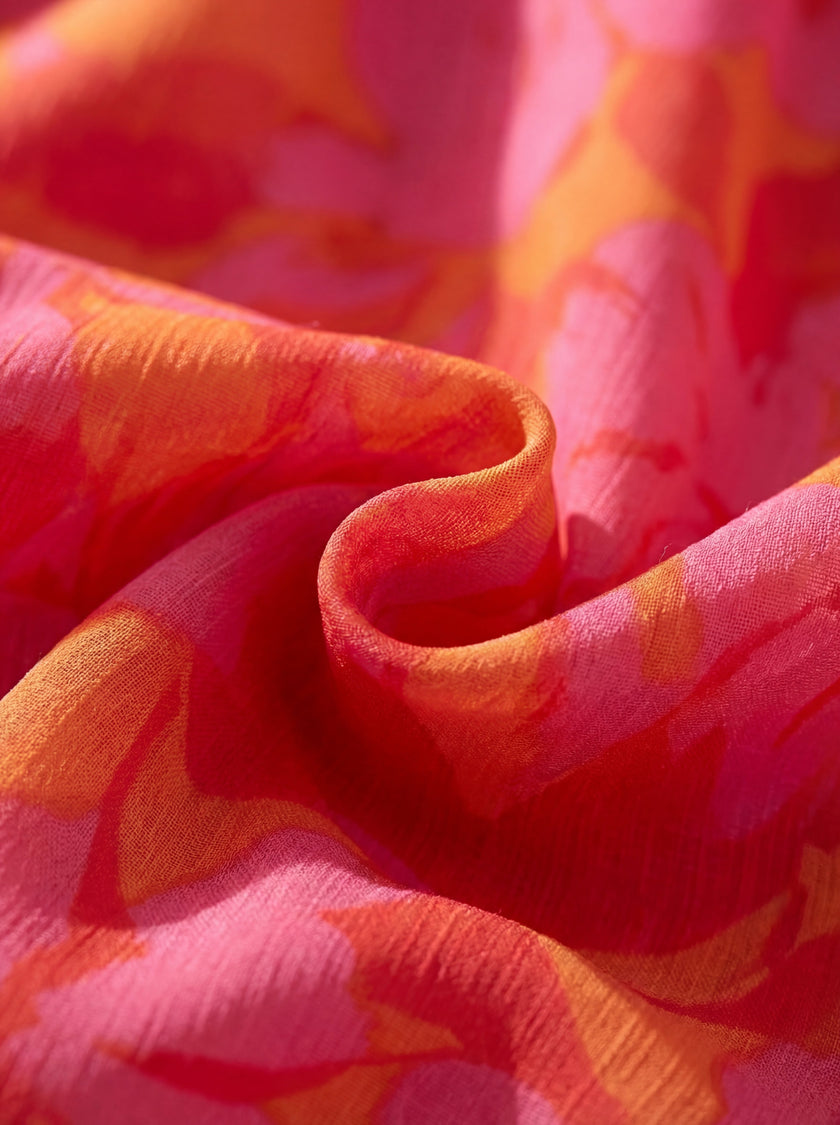FJØRNA elegant maxi dress for women featuring a V-neck design, flowing fabric, perfect for evening wear.