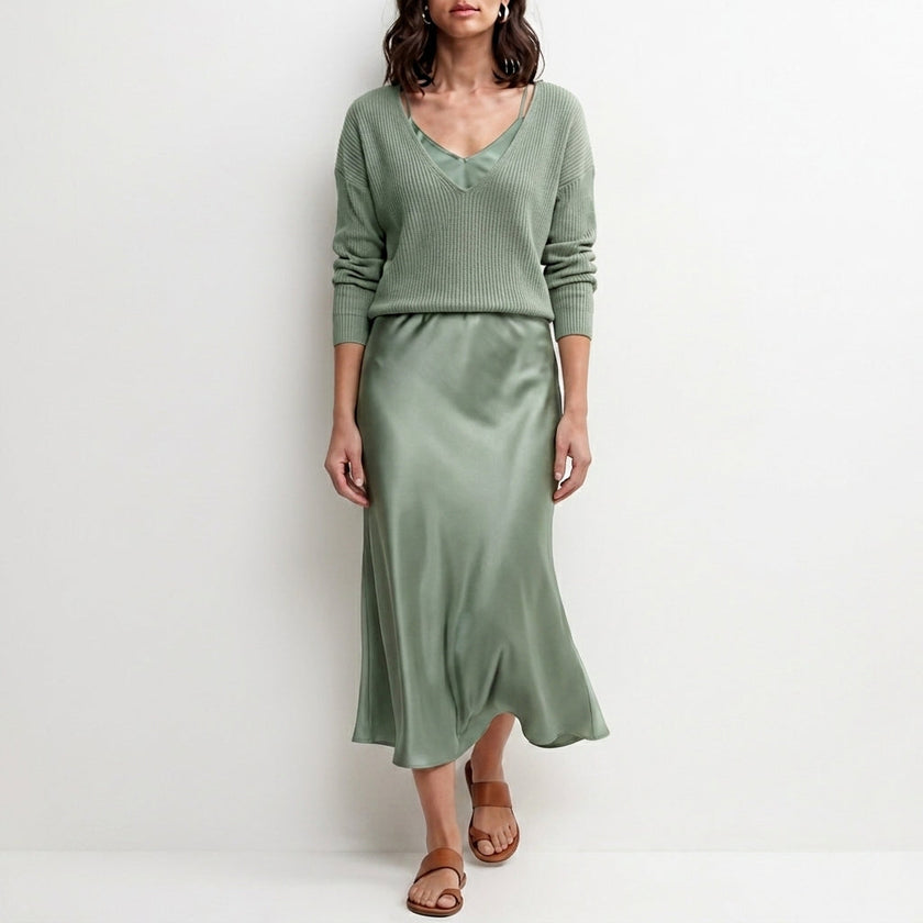 FJØRNA relaxed V-neck knit top and satin maxi skirt set in cyan, featuring a cozy knit top and flowing satin skirt.