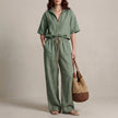 FJØRNA cyan zip-neck top and wide-leg trouser set, 2-piece outfit, featuring a relaxed fit and stylish design.